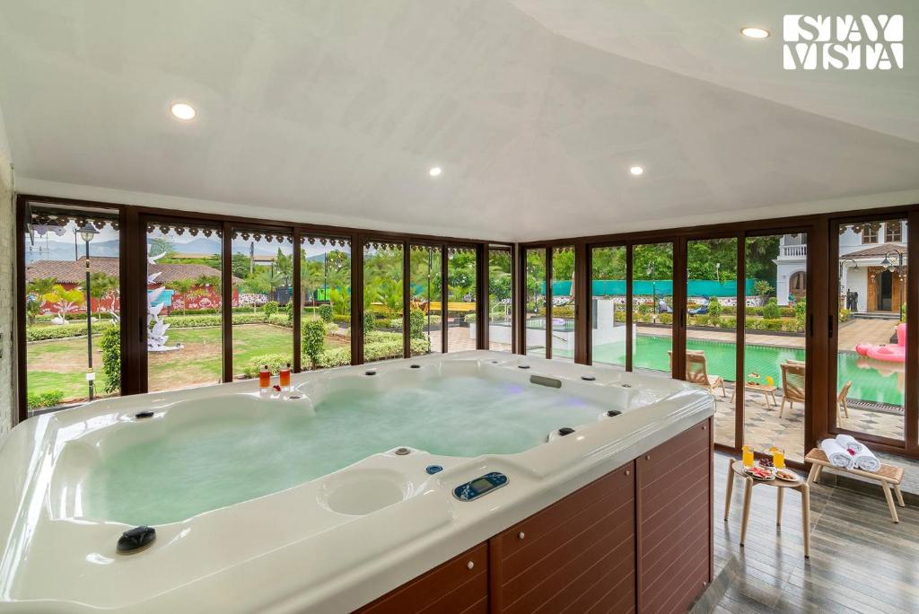 StayVista's Ashwamedha Manor Mountain-Side Luxury Retreat with Outdoor Pool, Jacuzzi, Spa & Steam Room StayVista's Ashwamedha Manor Mountain-Side Luxury Retreat with Outdoor Pool, Jacuzzi, Spa & Steam Room
